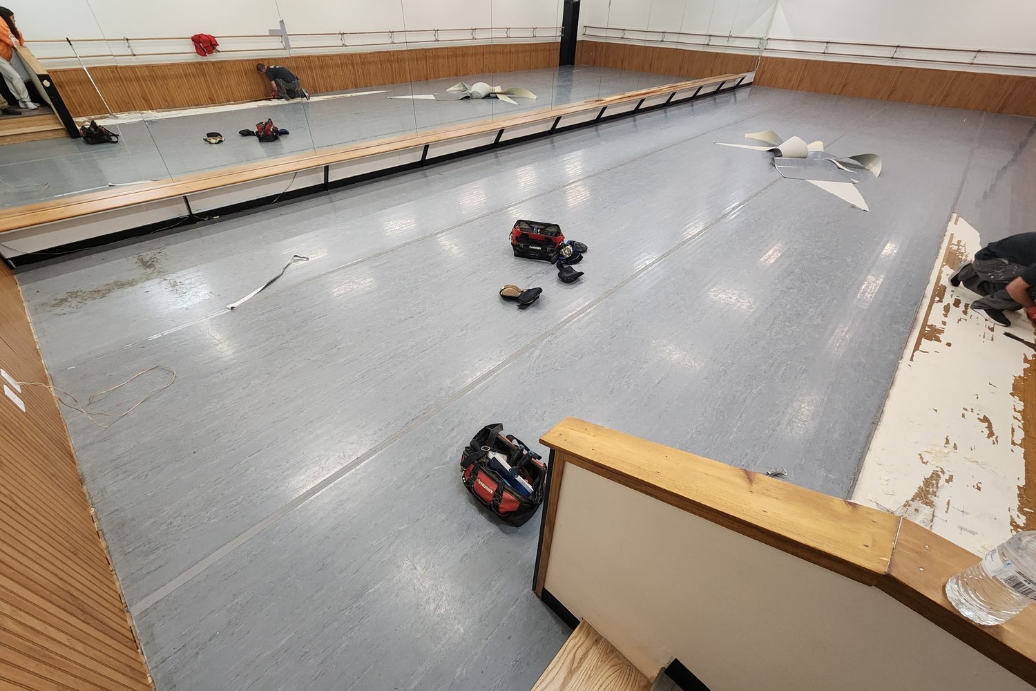 Hardwood floor before refinishing — worn surface and dull finish